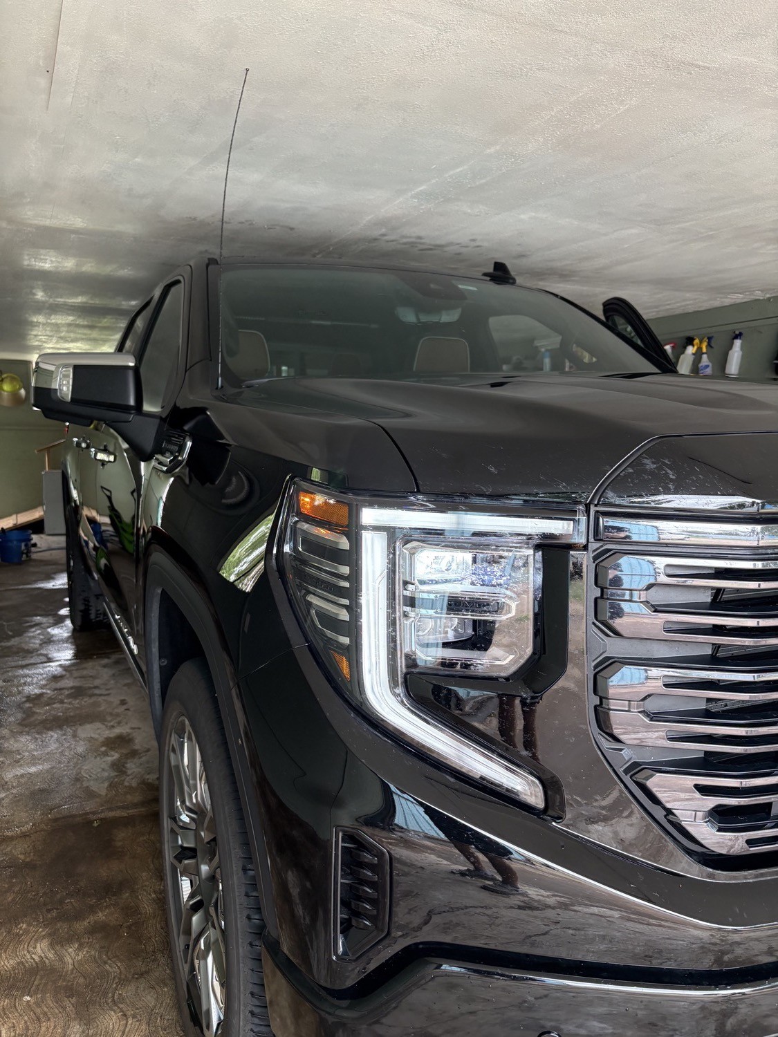Glossy black GMC truck detailed by AutoShine in Hooker, OK